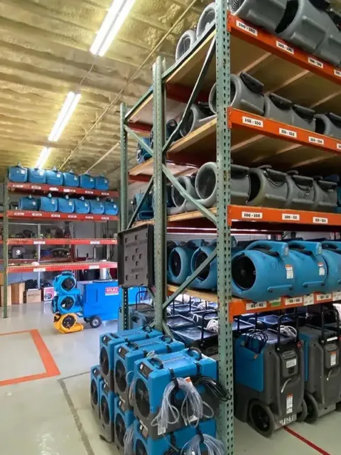 Shelves of restoration equipment in a warehouse