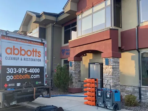 commercial-1 Abbott's truck and drying equipment outside a commercial property